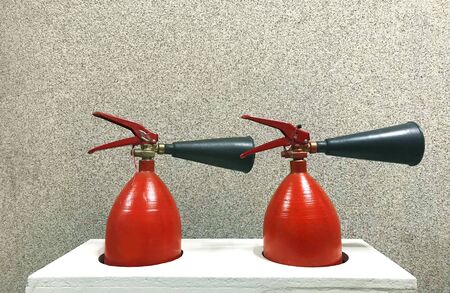 Fire safety concept with two fire extinguishersの写真素材
