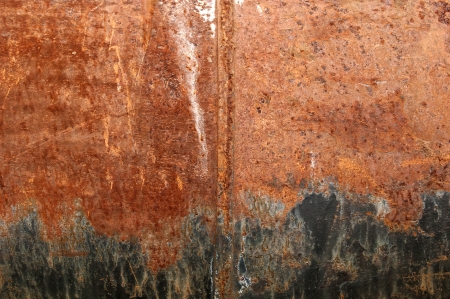 Surface of rusty tank closeup as backgroundの写真素材