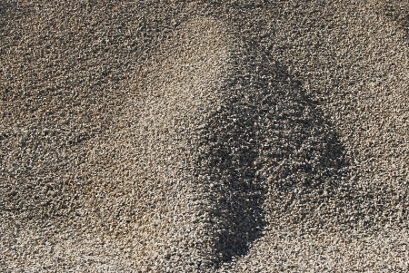 Pile of small gravel closeup as backgroundの写真素材