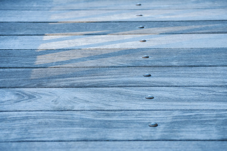 Blue wooden boards floor closeup as background