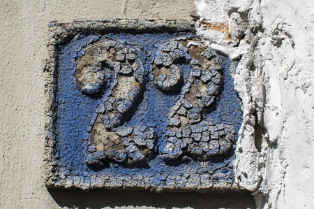 Old retro cast iron plate number 22の写真素材