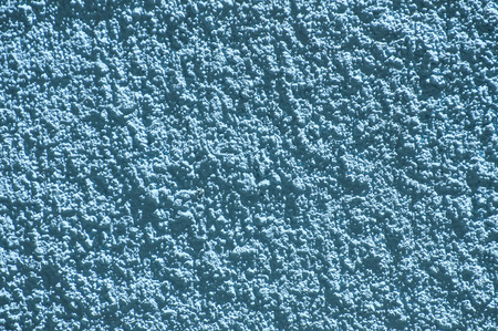 Blue color plaster house wall surface texture closeup as backgroundの写真素材