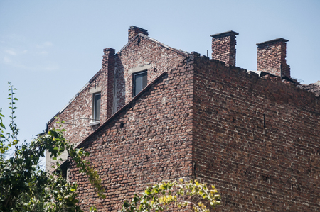 Old vintage grunge backside brick wall urban housesの写真素材
