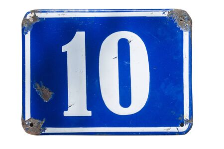 Weathered grunge square metal enameled plate of number of street address with number 10 closeup isolated on white backgroundの写真素材