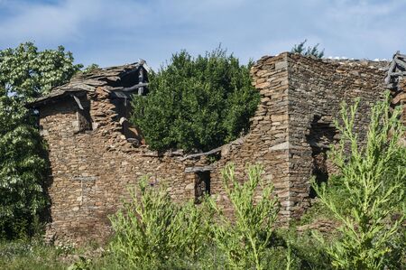 Old abandoned broken decayed rural country house