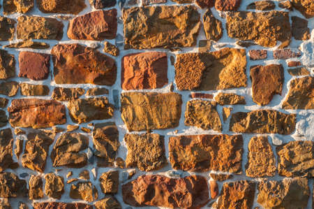 Rough sandstone wall closeup closeup as stone background