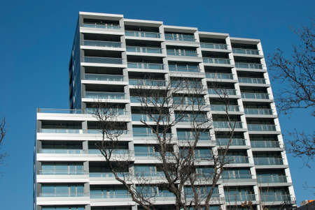 New build modern building closeup on blue sky backgroundの写真素材