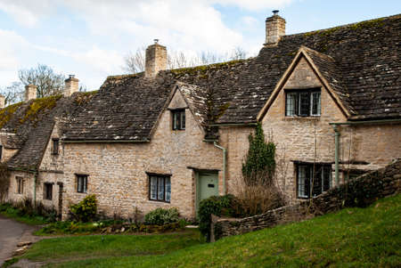 Old traditional romantic stone English country houseの写真素材