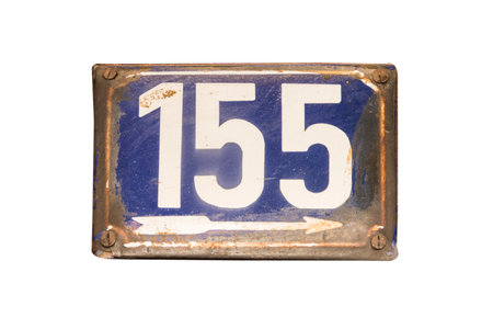Weathered grunge square metal enameled plate of number of street address with number 155 isolated on...