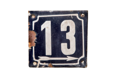 Weathered grunge square metal enameled plate of number of street address with number 13 isolated on white backgroundの写真素材