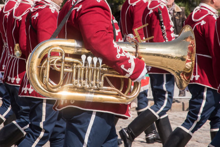 Tuba brass musical wind instrument outdoor at parade in sunny closeup