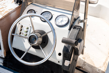 Steering wheel and dashboard of motorboat closeupの写真素材