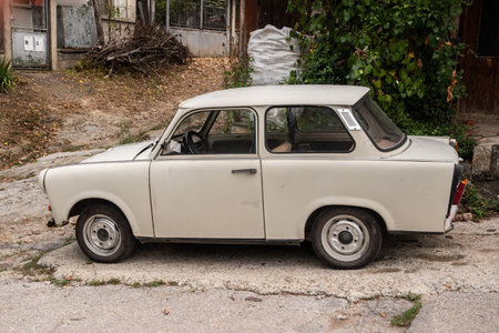 Vintage Trabant car in Eastern Europe village closeup