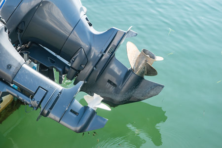 Boat propeller on the water surface, closeup of photoの写真素材