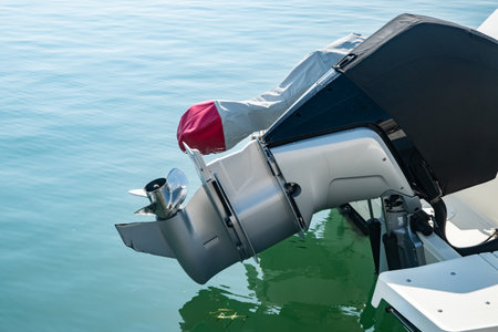 Close-up of the engine of a motorboat on the waterの写真素材