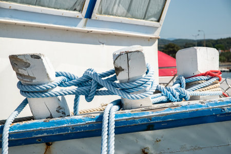 Close-up of mooring ropes on a fishing boat.