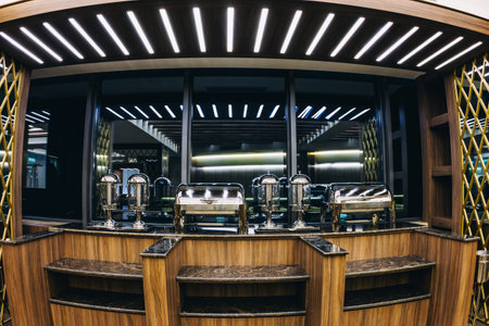 Empty food service steam pans in luxury buffetの写真素材