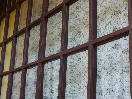 Old brown wooden windows in Hungaryの写真素材