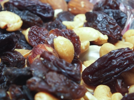 background of mixture of nuts and raisins, closeupの写真素材