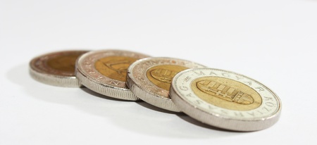 Some piece of hungarian coins are isolated on whiteの写真素材
