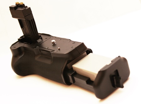 Dslr camrea battrey grip - isolated on whiteの写真素材