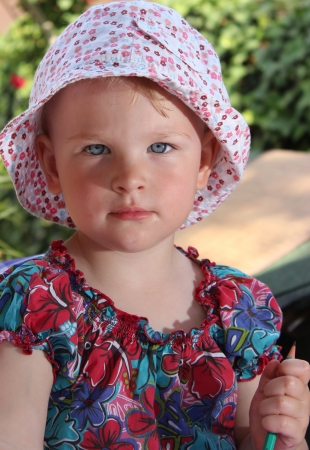 cute toddler girl in the garden - outdoor photographyの写真素材