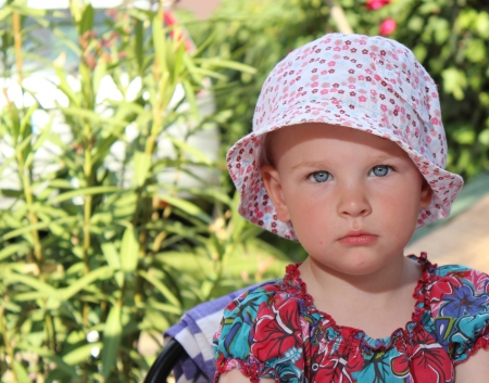 cute toddler girl in the garden - outdoor photographyの写真素材