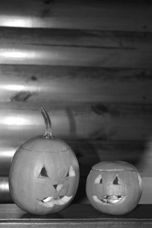 Halloween pumpkin head jack lantern with scary evil faces の写真素材
