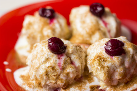 Cotagge cheese dumplings with sour cherry - food photographyの写真素材