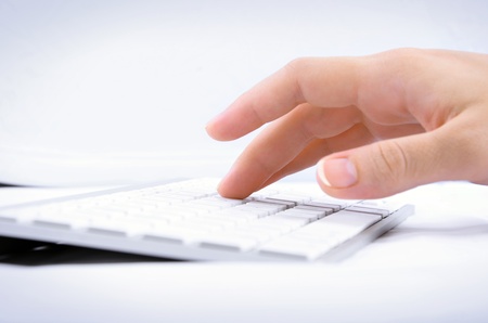 Woman hand typing on computer keyboard 