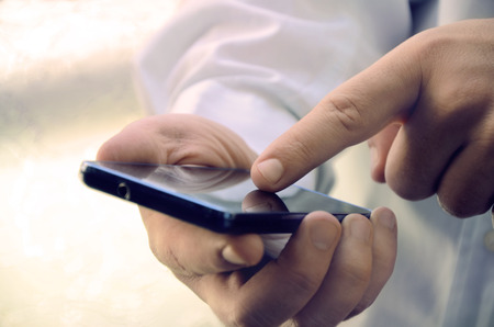 Business communication using modern smart phone technology    の写真素材