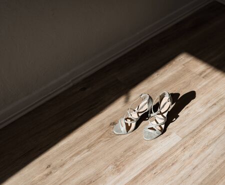 Morning bride. Bride wedding shoes on her tender feetの写真素材