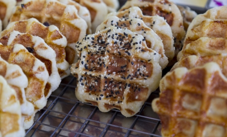 Delicious waffles topped with sugar and Sesame