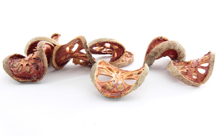 Bael fruit dried isolated on white background