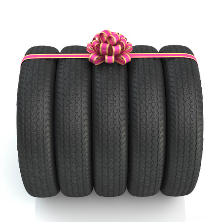 Many tires lie on each other. White background. 3dの写真素材