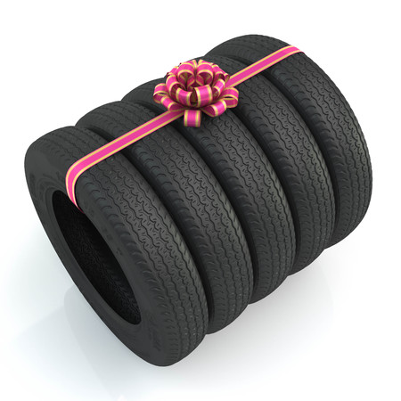 Many tires lie on each other. White background. 3dの写真素材