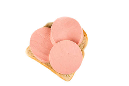 Bread and sausage on a white backgroundの写真素材