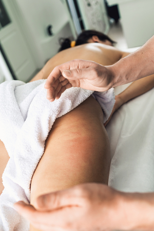 Anti-cellulite honey massage for healthy and smooth skin, organic therapy.の写真素材