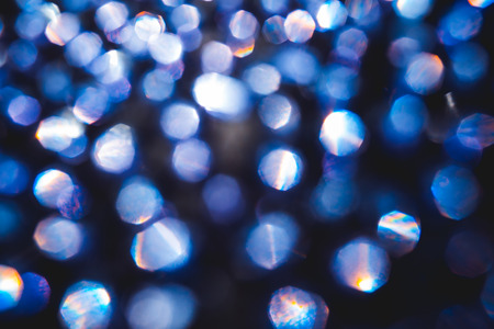 Abstract background of defocused rhinestones. Bokeh.
