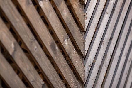 Wooden railing for a barn with firewoodの写真素材