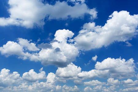 daytime sky with cumulus clouds.の写真素材