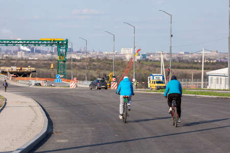 bridge construction and road signs with cyclists.の写真素材