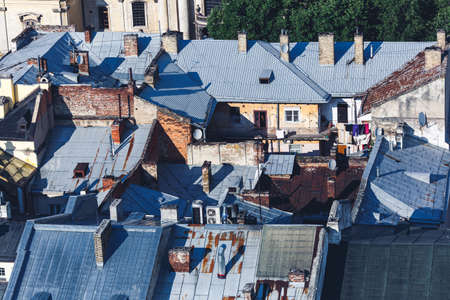 view from above steel roofs of old housesの写真素材