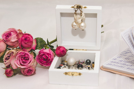 gift with a bouquet of miniature rosesの写真素材