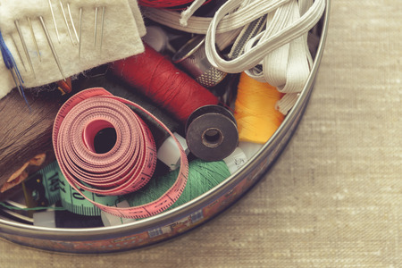 the composition of the seamstress, tailor, sewing thread and for knitting for the text substrateの写真素材