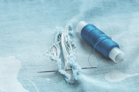 the composition of the seamstress, tailor, sewing thread and for knitting for the text substrate