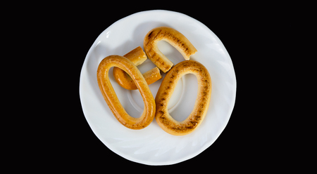 steering-wheels, cookies on a black background, confectionery, bakingの写真素材