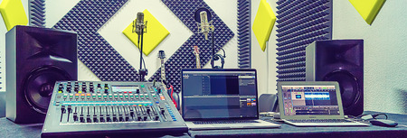 the mixer at recording studio to record music and a voice, selective focus