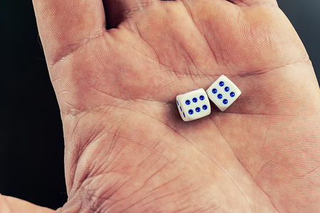 dice in hand, concept of winningの写真素材