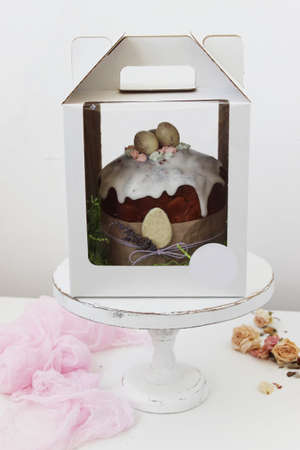 Cake with a sprig of lavender and white chocolate eggs. Symbol of the traditional Russian Orthodox...